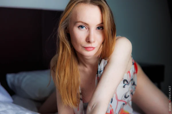 Perfect babe Adelina with string panties on the table