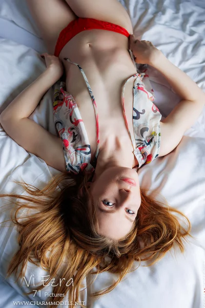 Vi Ezra sexy girl on the bed with pretty smile